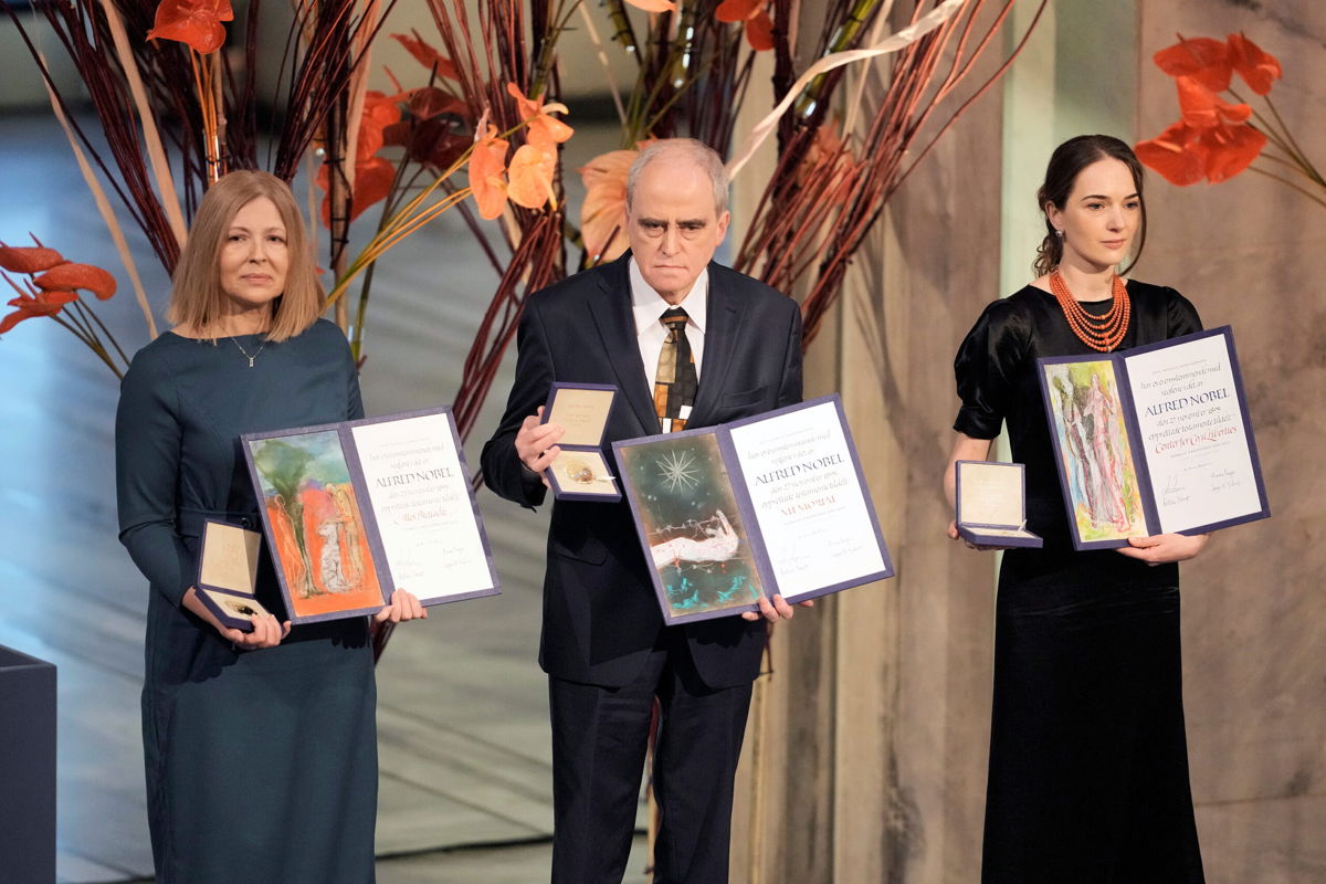 <i>Markus Schreiber/AP</i><br/>Representatives of the 2022 Nobel Peace Prize laureates collect the awards at Oslo City Hall.