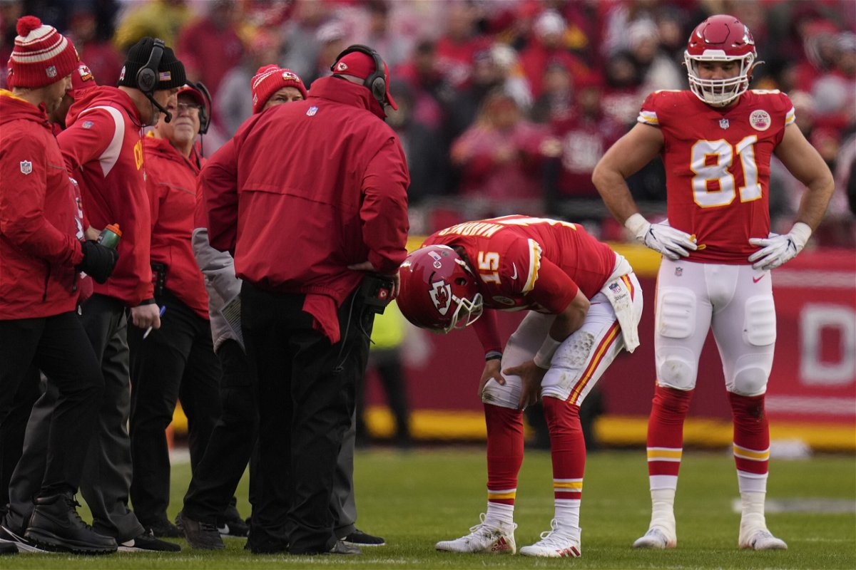 Kansas City Chiefs quarterback Patrick Mahomes (15) takes a moment after a play agaimst the Jacksonville Jaguars during the first half of an NFL divisional round playoff football game, Saturday, Jan. 21, 2023, in Kansas City, Mo. (AP Photo/Jeff Roberson)