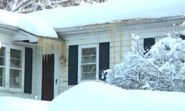 An ice dam forms as warm air inside your home rises