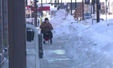 Randall Kitzman worries about the snow mounds on sidewalks.