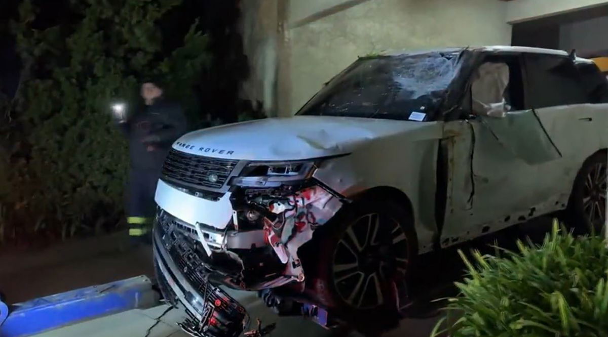 <i></i><br/>A suspected stolen vehicle being chased by officers in San Francisco's Twin Peaks area overnight Thursday rammed a police car before plunging off a hillside and landing on another vehicle.