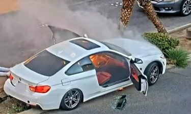 A tourist describes saving a man from a burning car on the Las Vegas Strip.