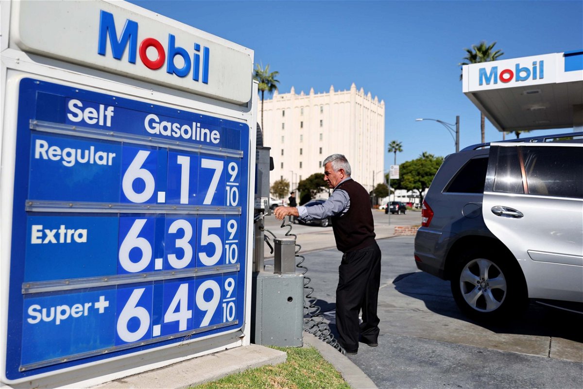 <i>Mario Tama/Getty Images</i><br/>The Mobil logo and gas prices are displayed at a Mobil gas station on October 28