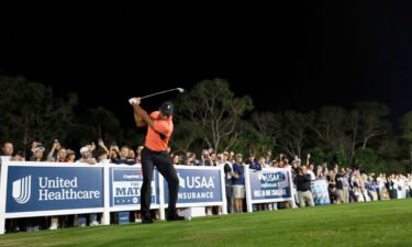 Tiger Woods plays his shot from the fifth tee during The Match 7 at Pelican Golf Club on December 10