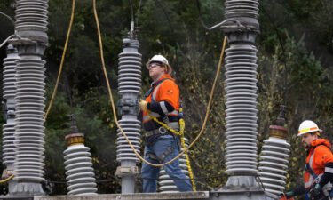A Tacoma Power crew works at an electrical substation damaged by vandals on December 25