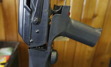 An AK-47 with a bump stock is pictured here.