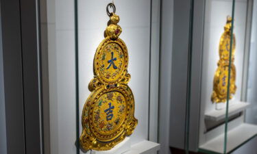 Some highlighted Lunar New Year-related objects on show include a pair of golden gourd-shaped decorations.