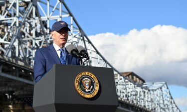 US President Joe Biden speaks about the bipartisan infrastructure law in front of the Brent Spence Bridge in Covington