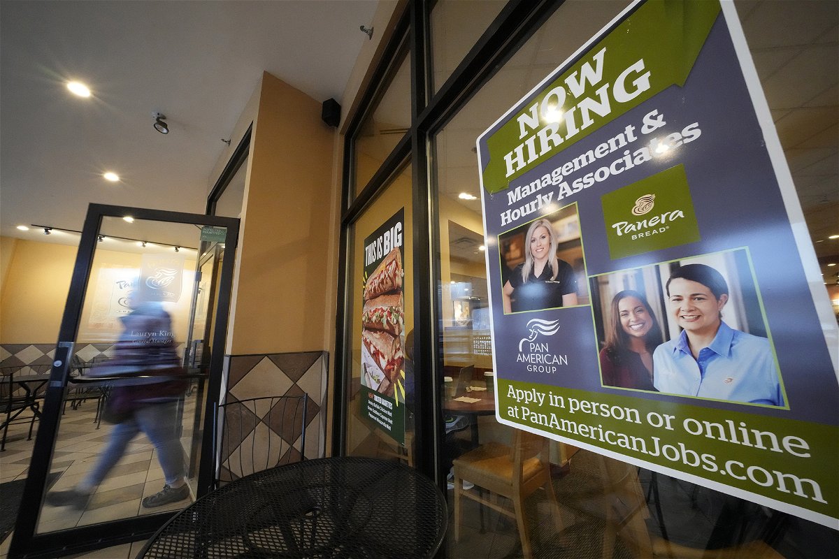 <i>Gene J. Puskar/AP</i><br/>A hiring sign is displayed in the window of a Panera Bread store in Pittsburgh on Monday