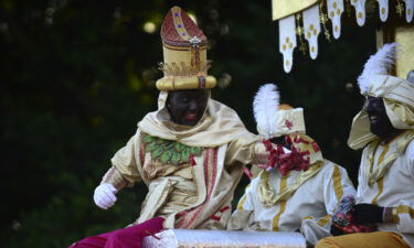 The traditional Spanish parade has been criticized for its continued use of blackface.