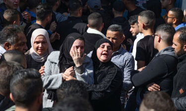 Family members of one of the Palestinian people killed during the Israeli raid on January 26