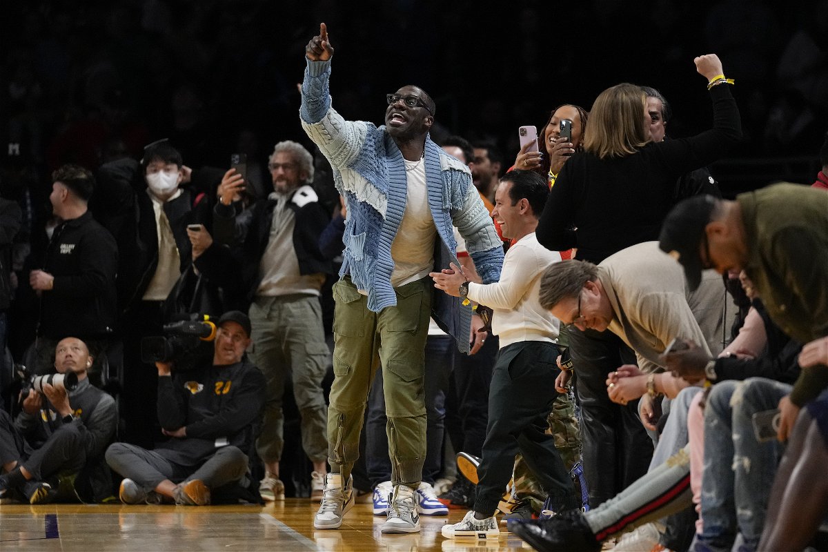 <i>Ashley Landis/AP</i><br/>Shannon Sharpe had to be escorted off the court at half-time before returning for the third quarter.