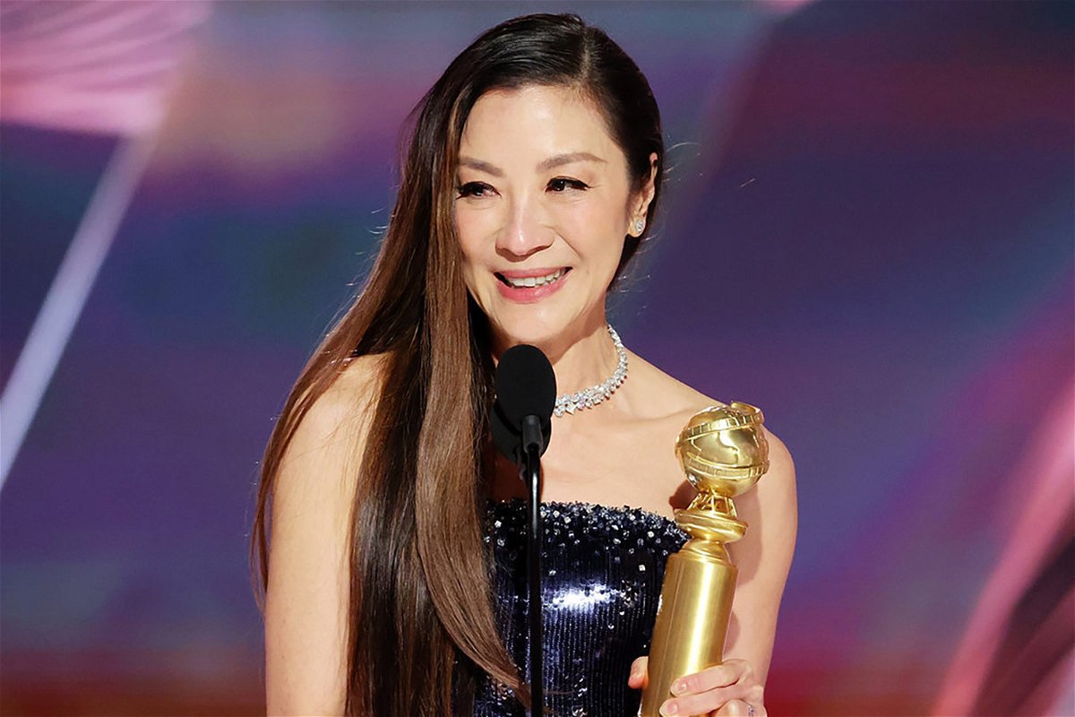 <i>Rich Polk/NBC</i><br/>Michelle Yeoh accepts the best actress in a motion picture -- musical or comedy award for 