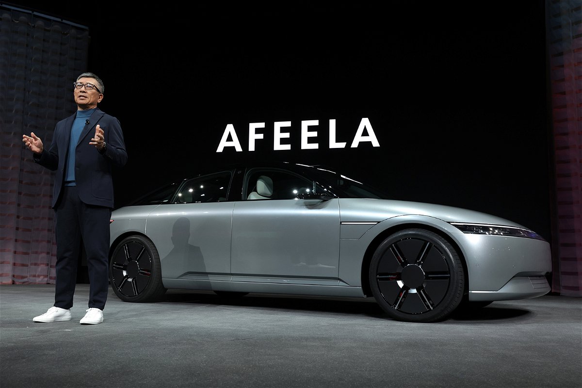<i>Alex Wong/Getty Images</i><br/>Sony Honda Mobility chief executive Yasuhide Mizuno is in front of an Afeela concept vehicle during a press event at CES 2023 on January 04