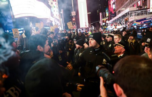 Police officers and protesters clash in New York on January 27.