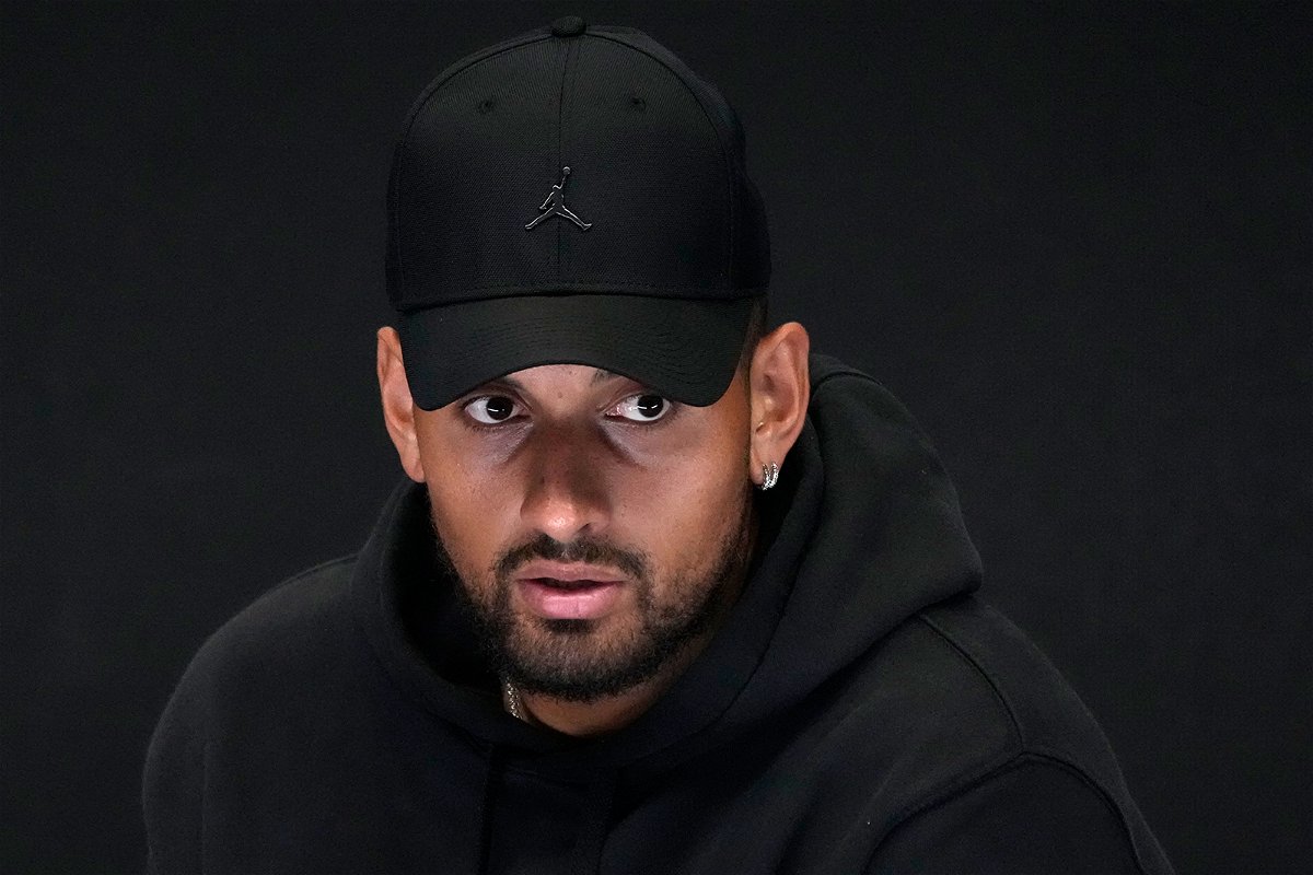 <i>Mark Baker/AP</i><br/>Australia's Nick Kyrgios announces his withdrawal from the 2023 Australian Open with a knee injury at a press conference in Melbourne