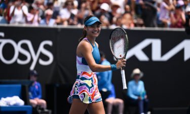 Raducanu celebrates victory after her first round match at the Australian Open.