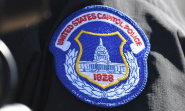 The US Capitol Police is ramping up its security posture and monitoring online chatter about planned protests set to occur on Friday's two-year anniversary of the January 6 attack on the US Capitol. The badge of acting Chief of Capitol Police Yogananda Pittman is seen here in 2021.