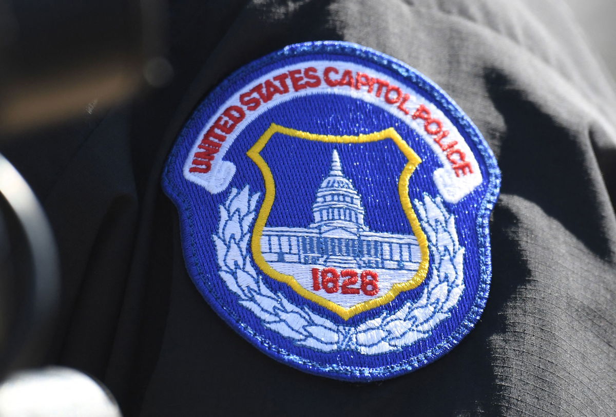 <i>Eric Baradat/AFP/Getty Images</i><br/>The US Capitol Police is ramping up its security posture and monitoring online chatter about planned protests set to occur on Friday's two-year anniversary of the January 6 attack on the US Capitol. The badge of acting Chief of Capitol Police Yogananda Pittman is seen here in 2021.