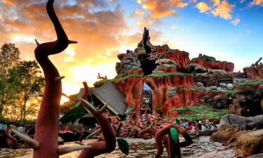 The sun sets on Splash Mountain in the Magic Kingdom at Walt Disney World