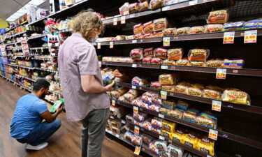 People shop for bread at a supermarket in Monterey Park