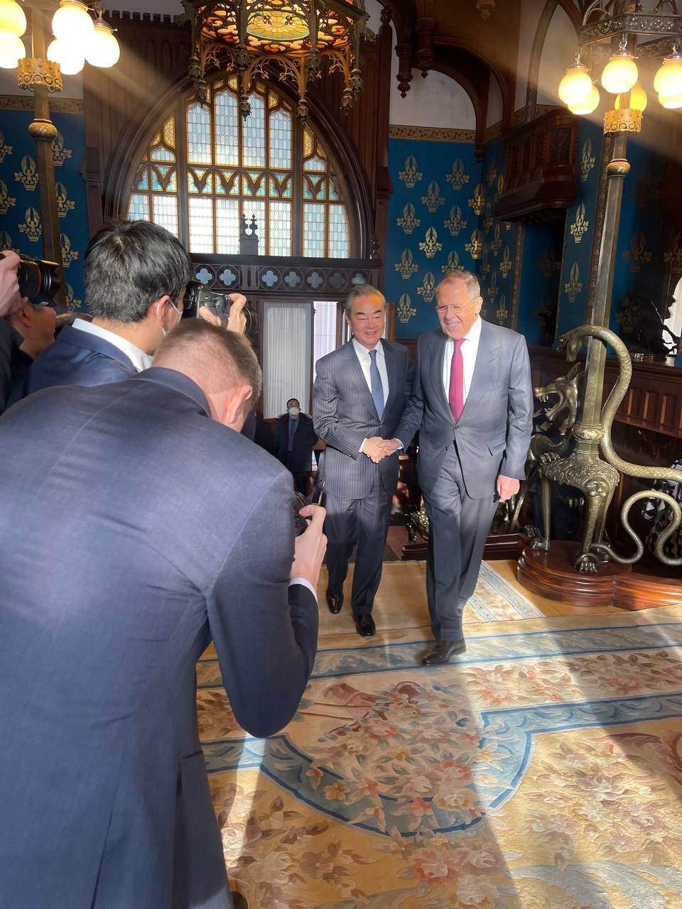 <i>Russian Foreign Ministry Maria Zakharova/Telegram</i><br/>Russian Foreign Minister Sergey Lavrov and his Chinese counterpart shake hands during a meeting in Moscow on Wednesday.