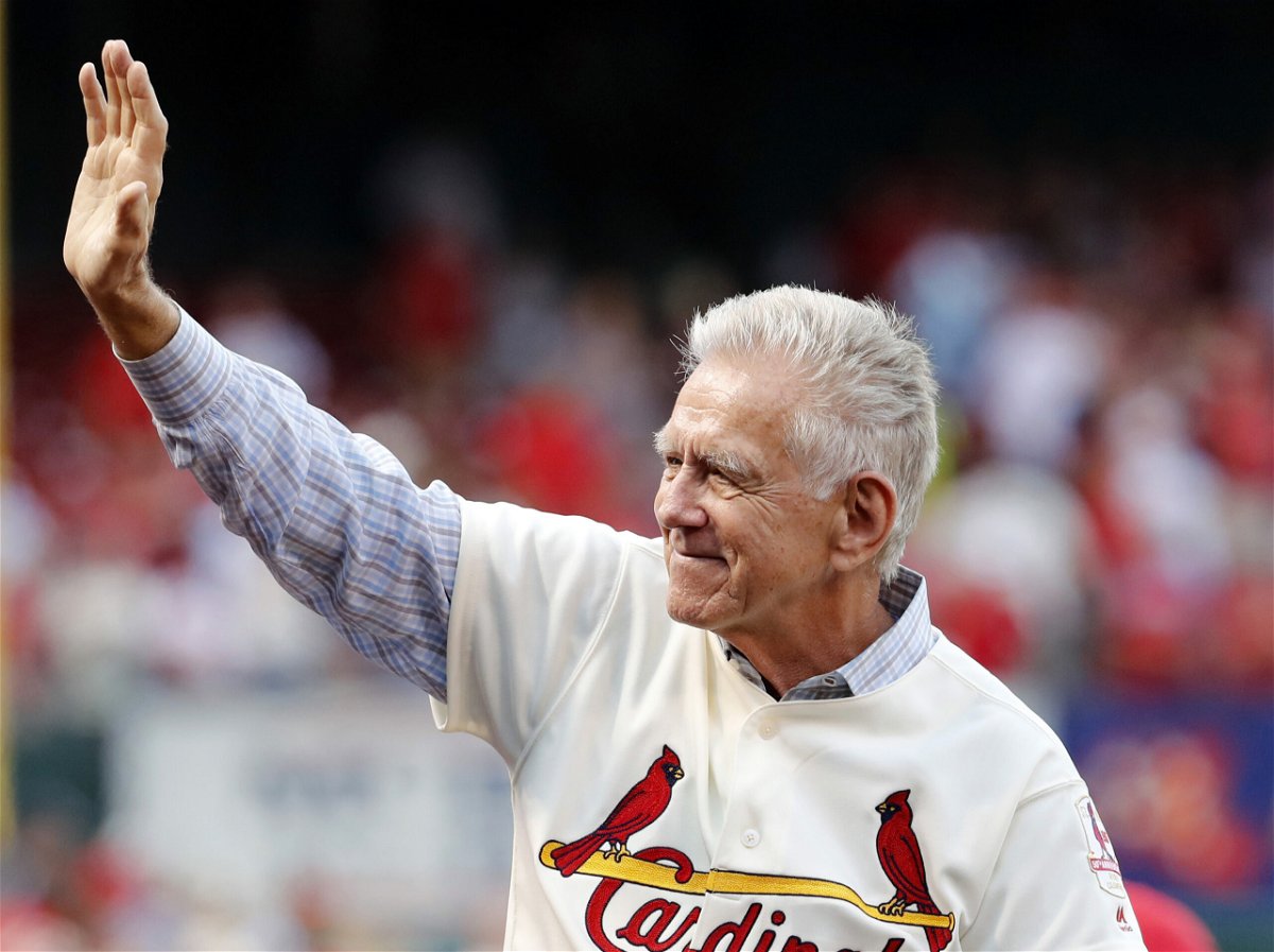 FILE -  Tim McCarver, a member of the St. Louis Cardinals' 1967 World Series championship team, takes part in a ceremony honoring the 50th anniversary of the victory before the start of a baseball game between the St. Louis Cardinals and the Boston Red Sox on May 17, 2017, in St. Louis. McCarver, the All-Star catcher and Hall of Fame broadcaster who during 60 years in baseball won two World Series titles with the St. Louis Cardinals and had a long run as the one of the country's most recognized, incisive and talkative television commentators, died Thursday morning, Feb. 16, 2023, in Memphis, Tenn., due to heart failure, baseball Hall of Fame announced. He was 81.  (AP Photo/Jeff Roberson, File)