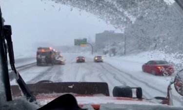 The Utah Department of Transportation posted a video on Twitter showing their trucks plowing snow on the I-215. The video also shows several cars struggling to move in the snow.