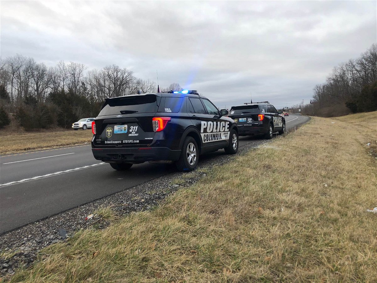 Columbia Police Department cruisers at the scene where a woman was found stabbed along Highway 63 on Friday, Feb. 10, 2023.