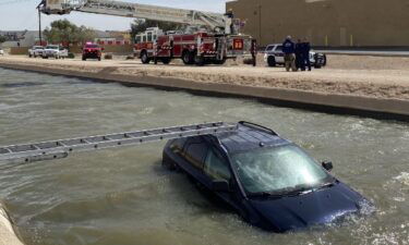 A woman has been taken to a hospital after her vehicle went into a canal. Just before noon Wednesday