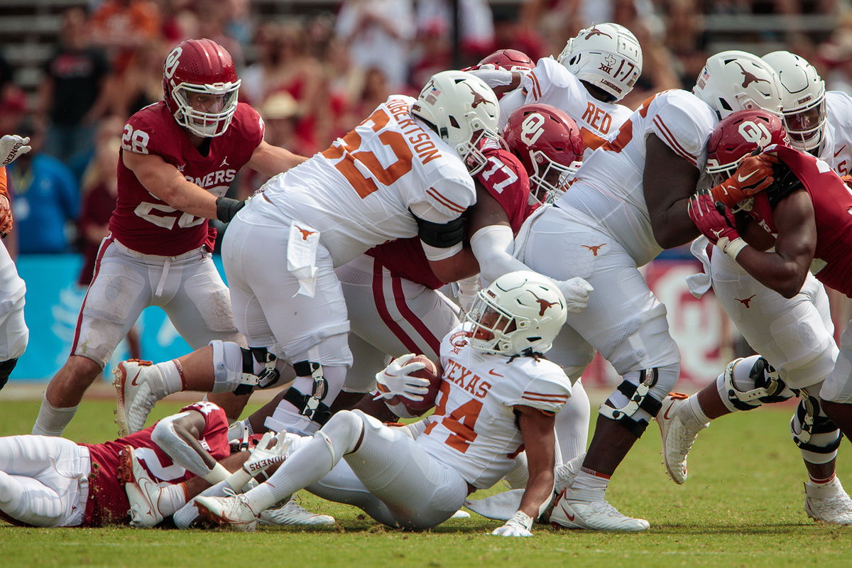 <i>William Purnell/Icon Sportswire/Getty Images</i><br/>Oklahoma Sooners and Texas Longhorns will leave the Big 12 for the Southeastern Conference  a year earlier than planned. The two teams face off here on October 8