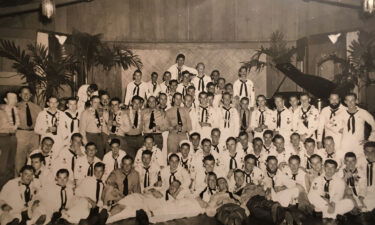 The Albacore crew pictured in 1944. Lt. Bower is the 7th person from the right in the first row of standing men.