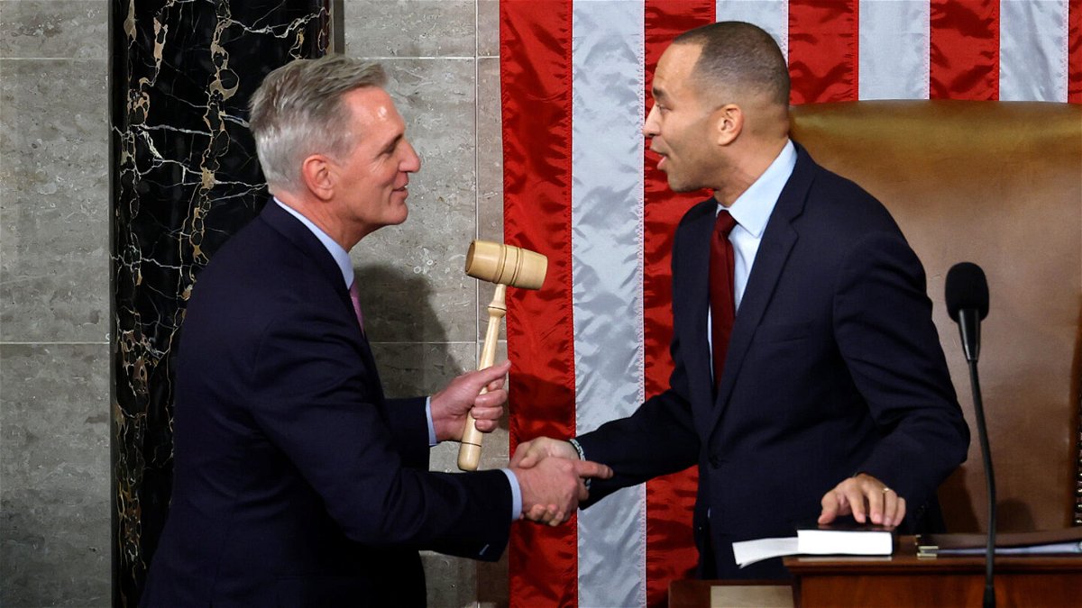<i>Chip Somodevilla/Getty Images</i><br/>Speaker of the House Kevin McCarthy (left) shakes hands with House Democratic Leader Hakeem Jeffries after McCarthy was elected Speaker in the House Chamber at the U.S. Capitol Building on January 7.