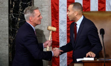 Speaker of the House Kevin McCarthy (left) shakes hands with House Democratic Leader Hakeem Jeffries after McCarthy was elected Speaker in the House Chamber at the U.S. Capitol Building on January 7.