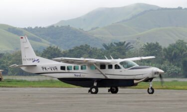 New Zealand pilot is held hostage by separatist fighters in Indonesia. Pictured is a Susi Air plane (not the one involved in the incident on Tuesday) in Papua province in 2011.