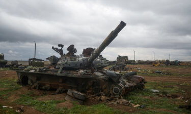 A destroyed Russian tank is pictured after Russia's retreat from Kherson