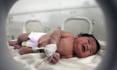 The baby girl receives treatment inside an incubator at a children's hospital in the town of Afrin