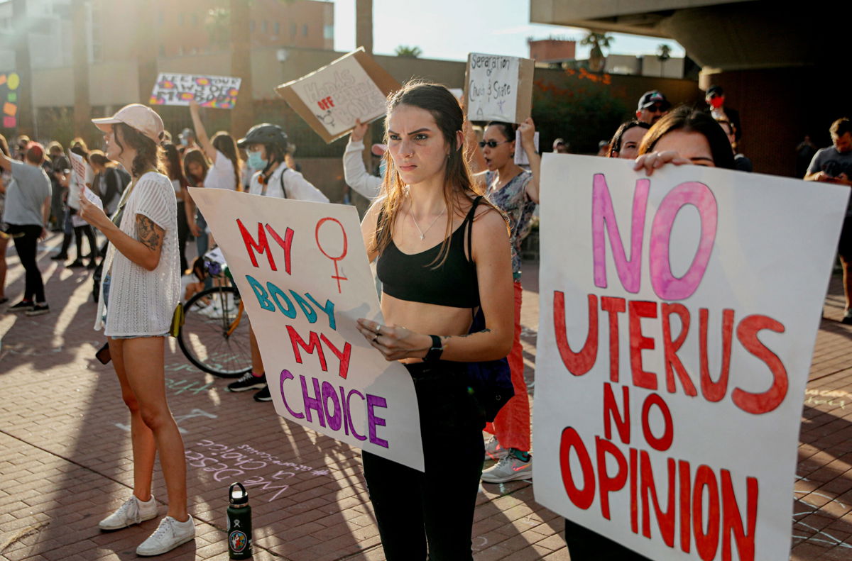 <i>Sandy Huffaker/AFP/Getty Images</i><br/>Abortion rights protesters chant during a Pro Choice rally at the Tucson Federal Courthouse in Tucson