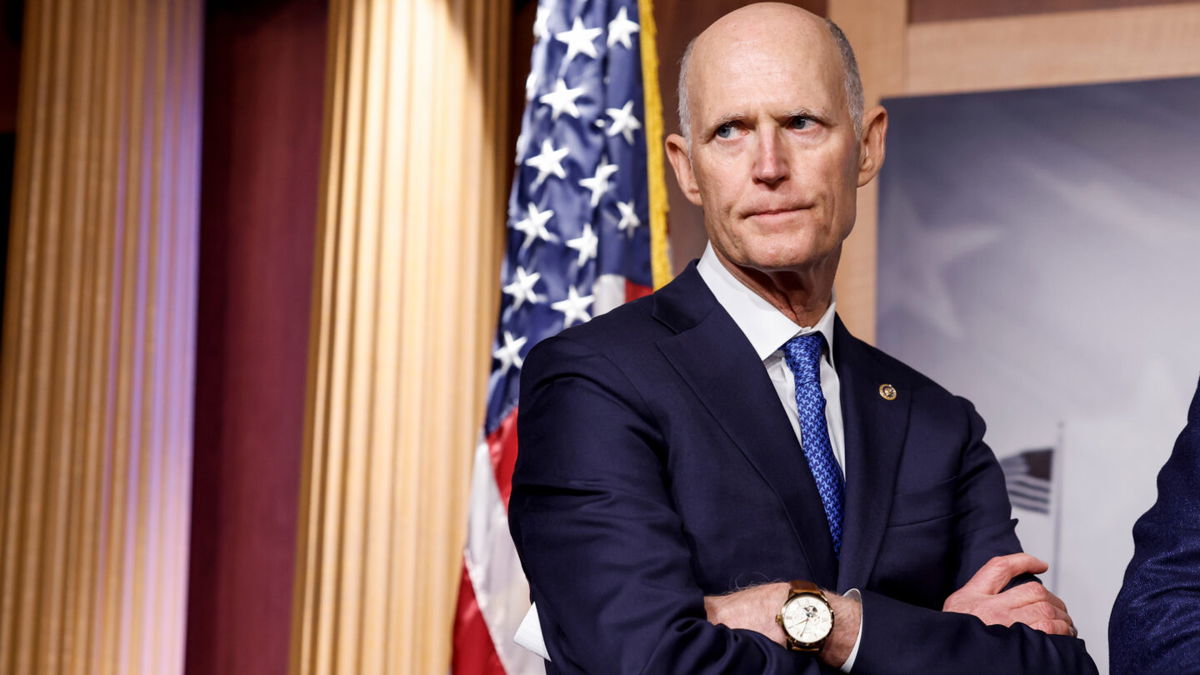 <i>Anna Moneymaker/Getty Images</i><br/>Sen. Rick Scott listens during a news conference at the Capitol Building on January 25 in Washington.