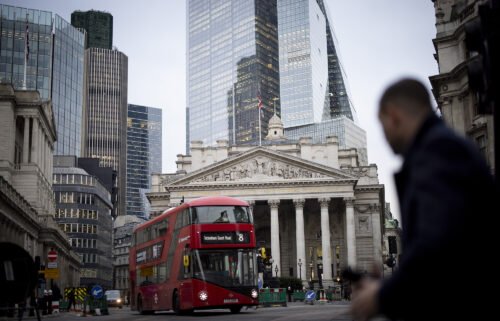 A person crosses the street outside the Bank of England in London on January 23.