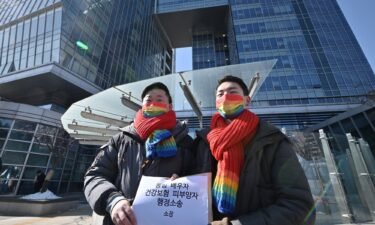 A South Korean court on February 21 ruled in favor of a same-sex couple seeking equal health benefits. So Seong-wook and Kim Yong-min