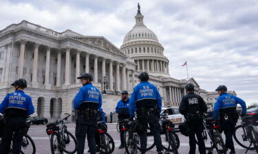 US Capitol police officers guard the perimeter of the Capitol on January 6 in Washington