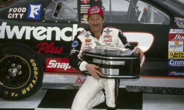 Dale Earnhardt victorious in victory lane after winning the 1998 Daytona 500.