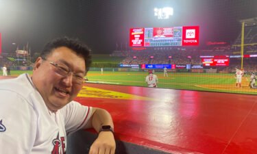 Kotaro Toriumi is one Japanese person who intends to keep traveling overseas: he's pictured here at a Los Angeles Angels baseball game.