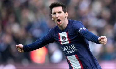 PSG's Lionel Messi celebrates after scoring his side's fourth goal during the French League One soccer match between Paris Saint-Germain and Lille at the Parc des Princes stadium