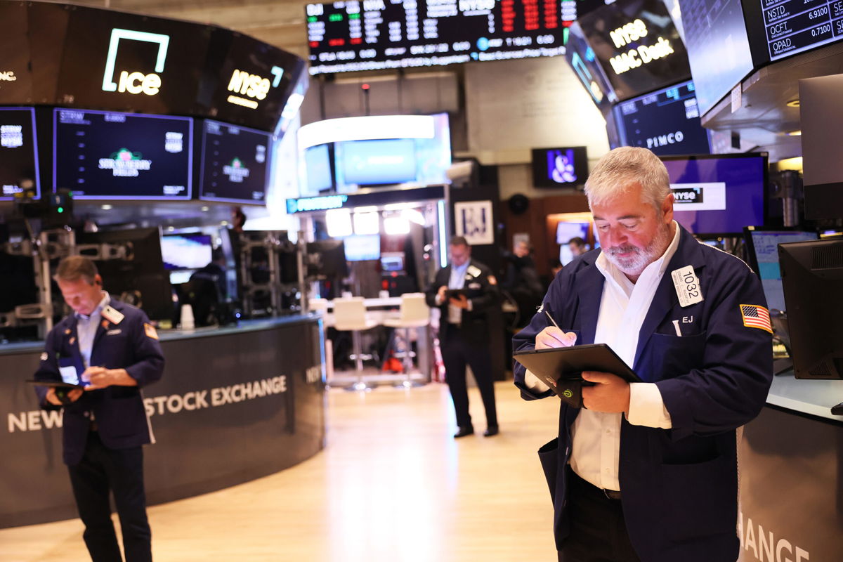 <i>Michael M. Santiago/Getty Images</i><br/>Traders work on the floor of the New York Stock Exchange on Wednesday