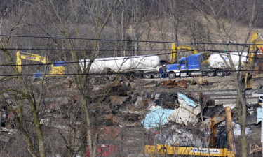 Workers continue to clean up remaining tank cars