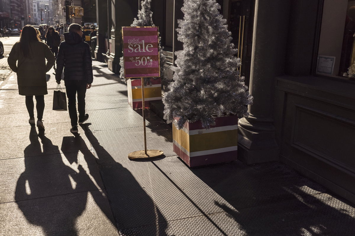 <i>Victor J. Blue/Bloomberg/Getty Images</i><br/>Shoppers in the SoHo neighborhood of New York