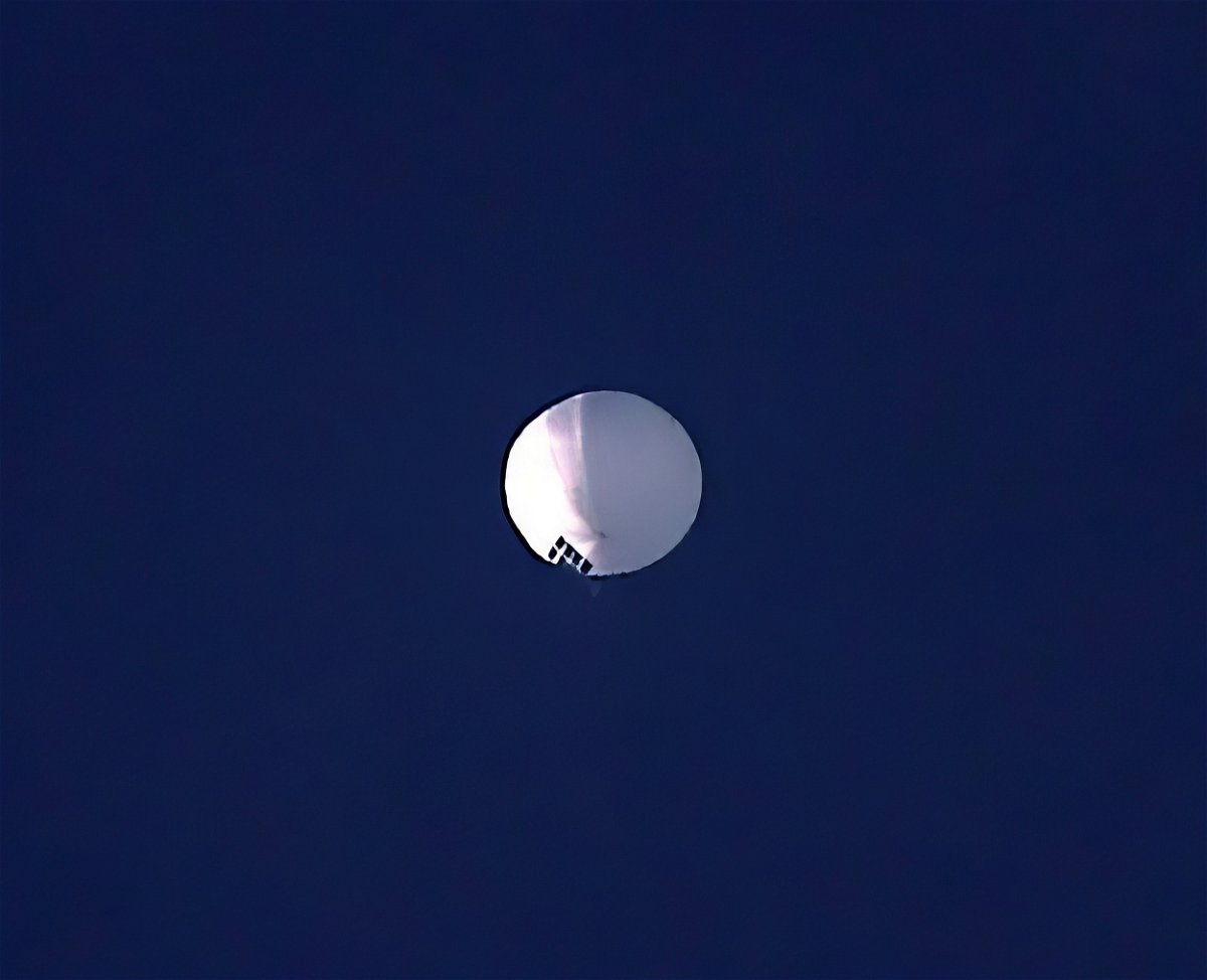 <i>Larry Mayer/The Billings Gazette/AP</i><br/>A suspected Chinese high altitude balloon floats over Billings