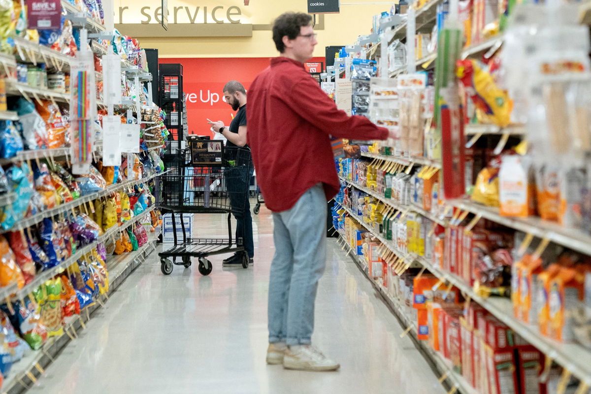 <i>Stefani Reynolds/AFP/Getty Images</i><br/>Prices are still rising at a pace well above the Fed's 2% goal and the public is becoming increasingly weary. Pictured are grocery shoppers at a store in Washington